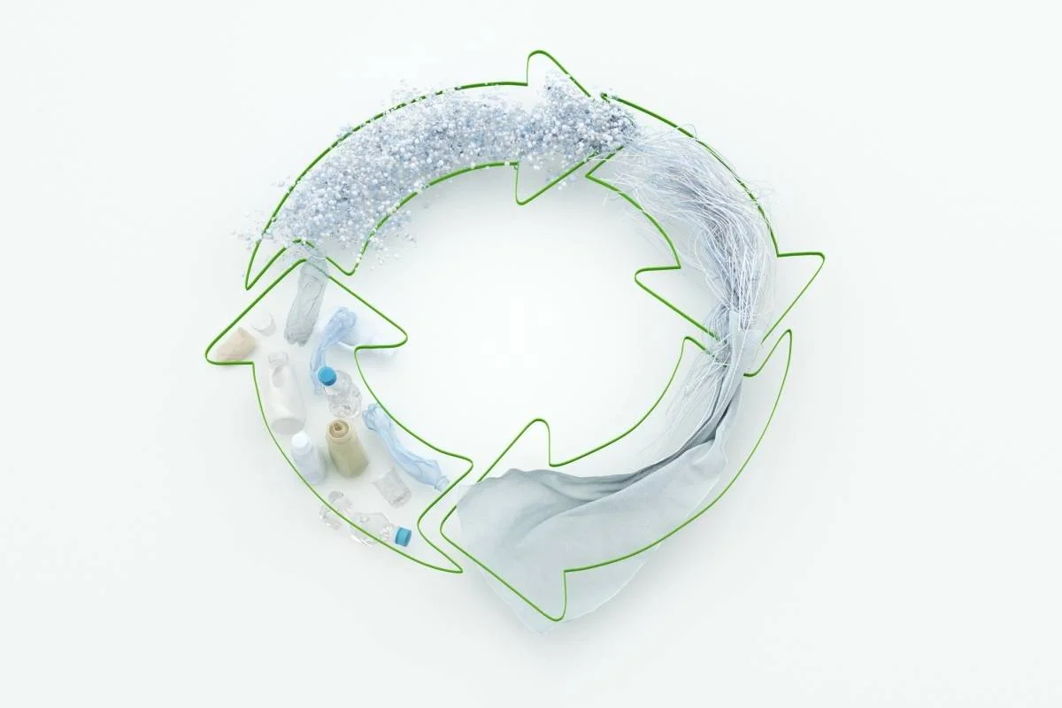 Circular economy symbol represented with plastic products